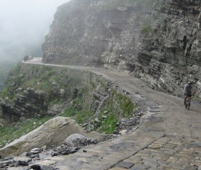 Richard Searle Cycling on the  tour with redspokes